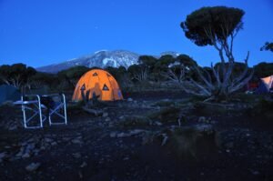 Tents at a campsite at dusk in Tanzania